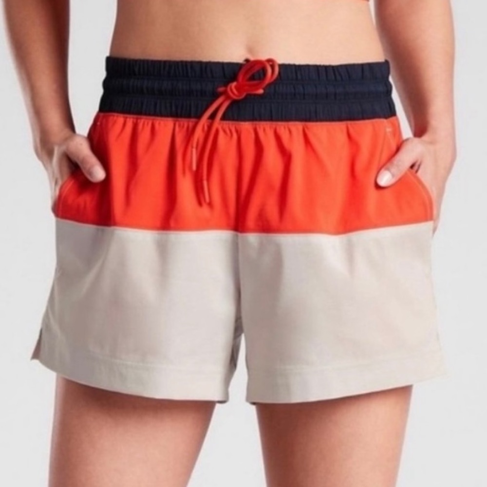 Like new Athleta Oahu navy and orange colorblock shorts, size 4